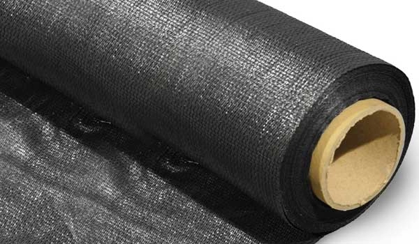 Woven geotextile sheet for slope and bank reinforcement